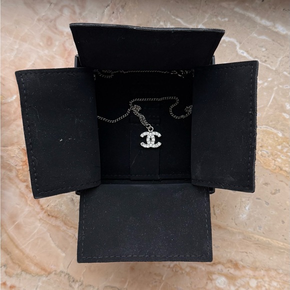 Chanel Silver Necklace with Logo Pendant